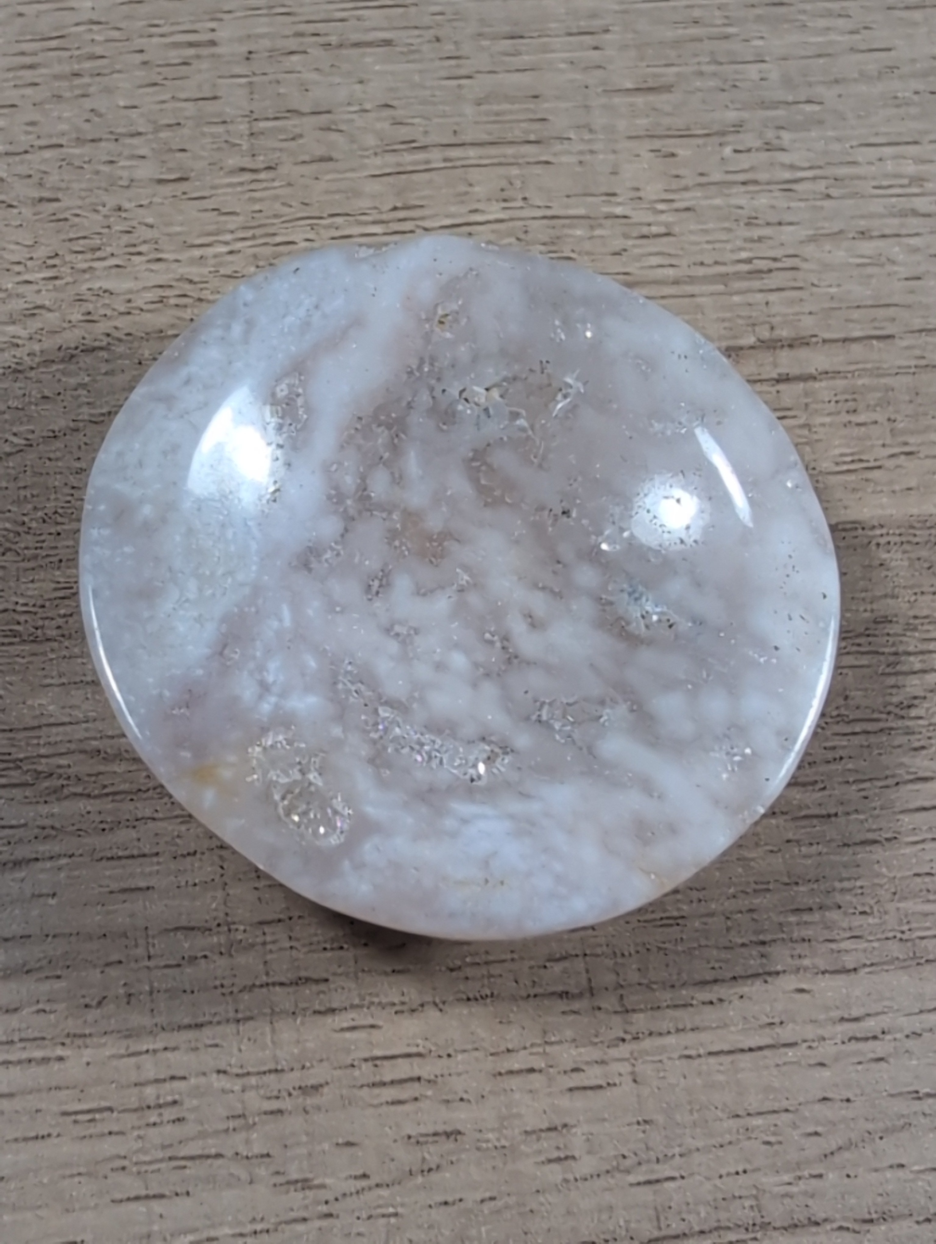 Round flower agate bowl by Syn's Crystal Co featuring vibrant, polished flower agate with natural banding and smooth, rounded edges.