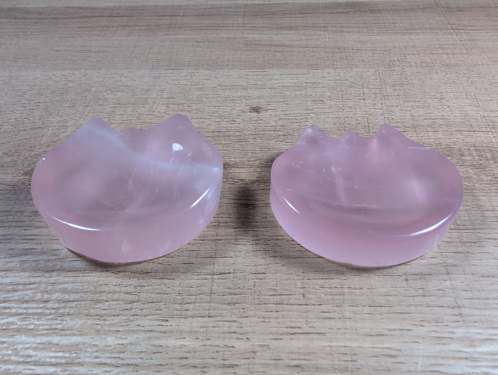 Cat-shaped rose quartz bowl by Syn's Crystal Co, featuring a smooth pink gemstone with a detailed feline design.