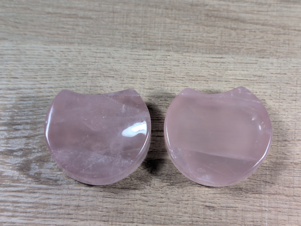 Shaped rose quartz bowl from Syn's Crystal Co featuring smooth, polished pink gemstone with a rounded, decorative design.