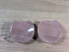 Shaped rose quartz bowl from Syn's Crystal Co featuring smooth, polished pink gemstone with a rounded, decorative design.