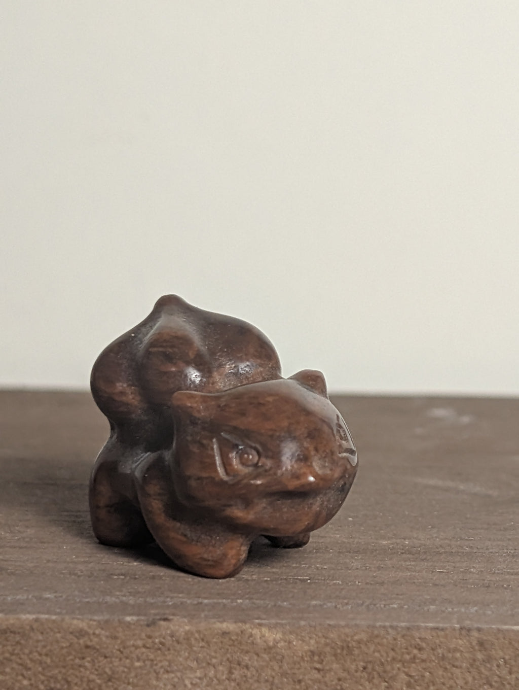 Hand-carved Bulbasaur crystal figurine by Syn's Crystal Co, featuring gemstone details for growth and nature-inspired decor.