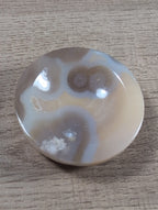 Round Flower Agate Bowl with vibrant pink, orange, and yellow flower patterns, crafted by Syn's Crystal Co.