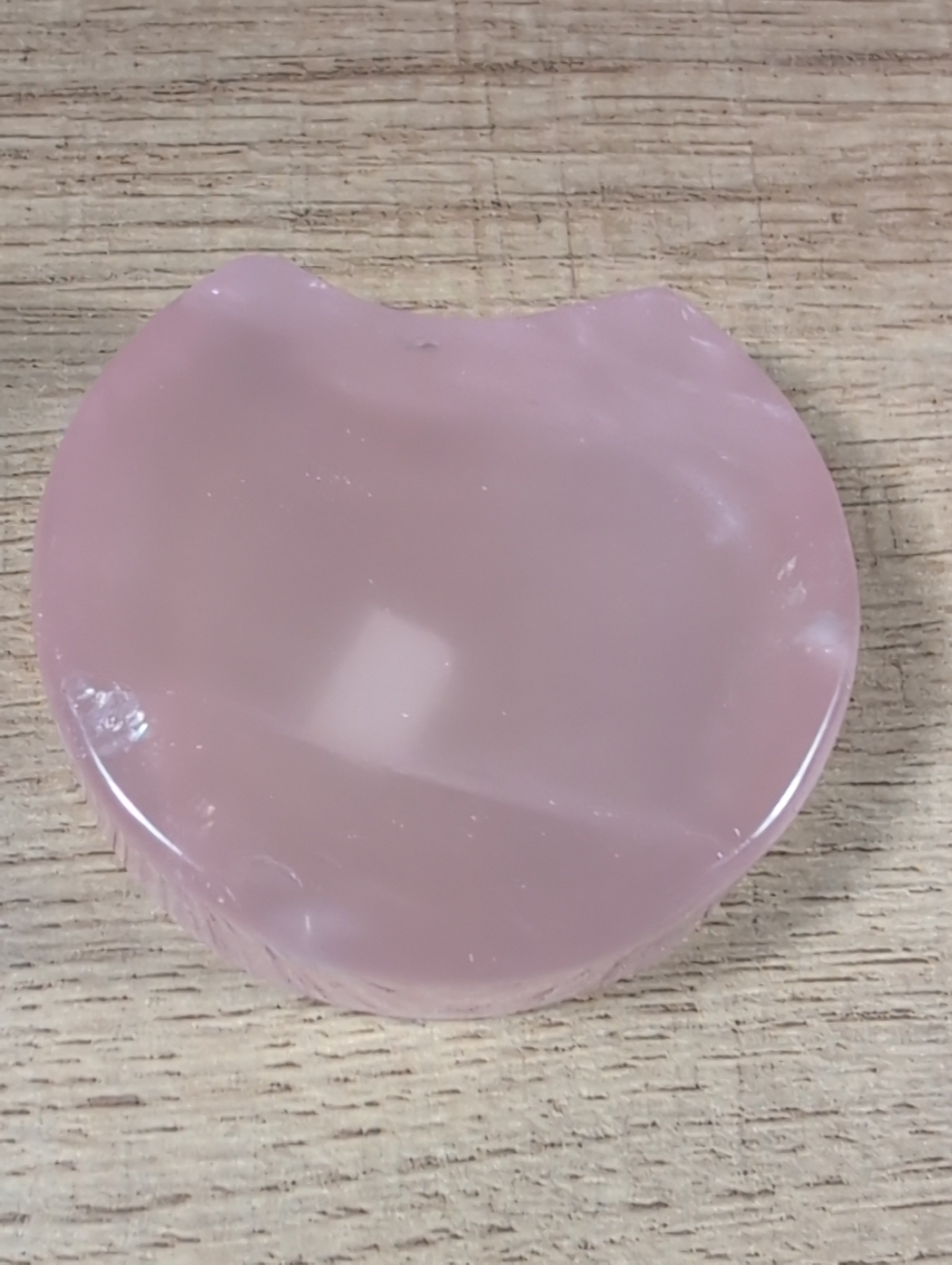 Shaped rose quartz bowl by Syn's Crystal Co showcasing a smooth, polished pink gemstone bowl with gentle curves and natural stone texture.