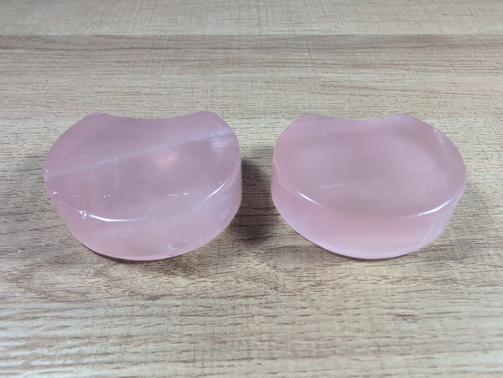Shaped rose quartz bowl from Syn's Crystal Co, smooth pink gemstone with rounded edges and polished surface.