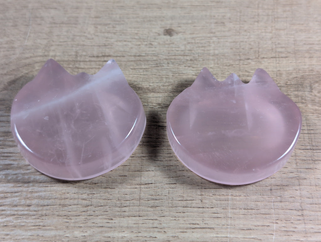 Cat-shaped rose quartz bowl from Syn's Crystal Co, featuring a smooth, pink gemstone surface with detailed cat design.