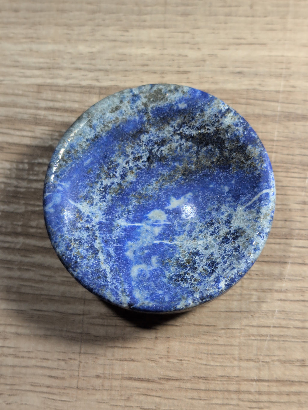 Lapis Lazuli crystal bowl by Syn's Crystal Co, natural blue gemstone dish for wisdom, intuition, and chakra display.