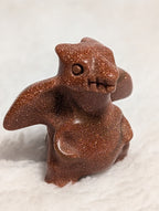 Charizard Pokémon mini carving by Syn's Crystal Co featuring a detailed crystal sculpture of the iconic fire-type Pokémon.