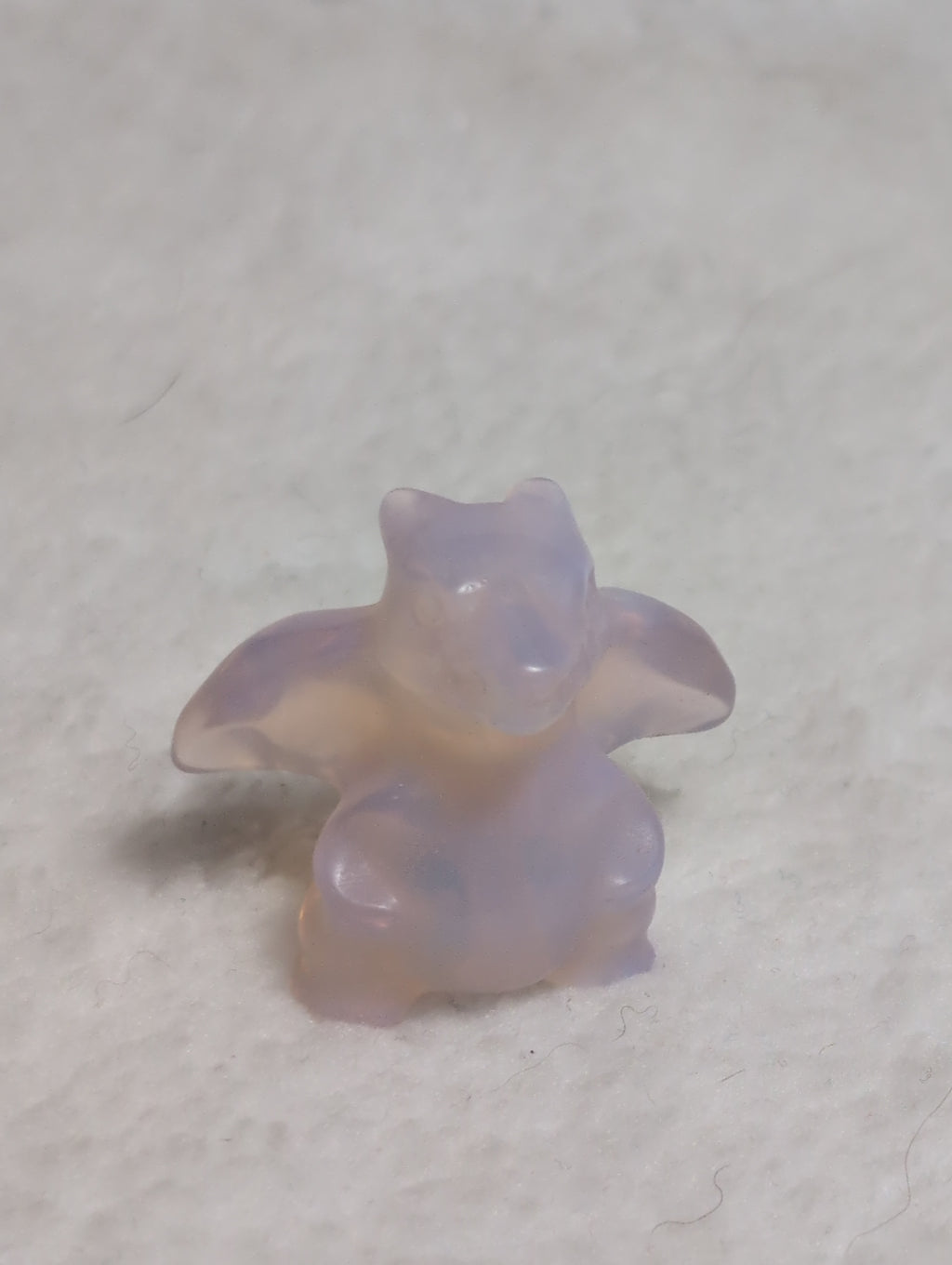 Mini Charizard Pokemon carving by Syn's Crystal Co, featuring detailed crystal sculpture of the iconic fire Dragon Pokémon.