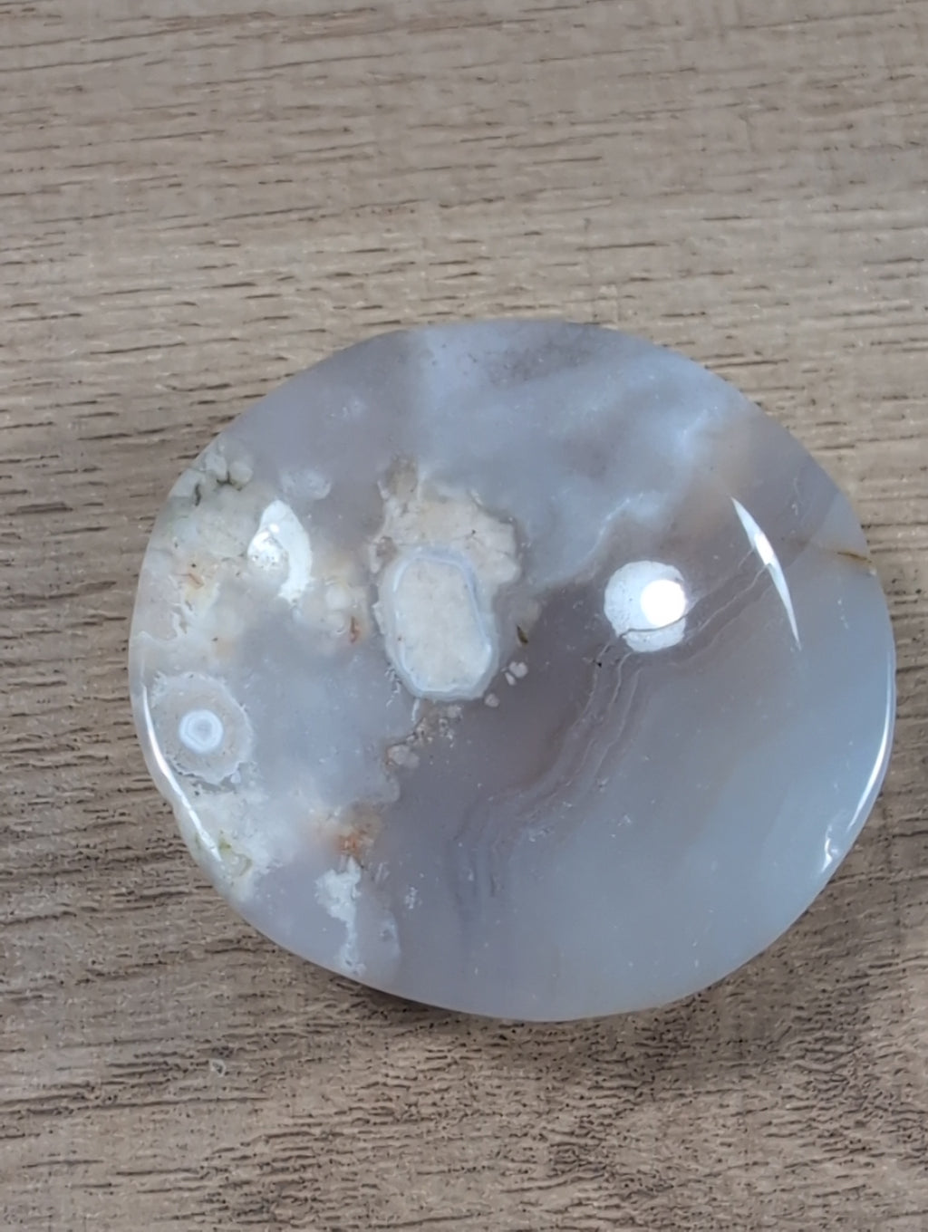 Round flower agate bowl from Syn's Crystal Co showcasing vibrant, layered flower patterns and smooth polished surface.