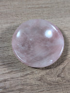 Round rose quartz bowl from Syn's Crystal Co, smooth pink gemstone with a polished finish and rounded shape.