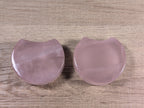 Shaped rose quartz bowl by Syn's Crystal Co, smooth polished pink gemstone with natural stone patterns and rounded edges.